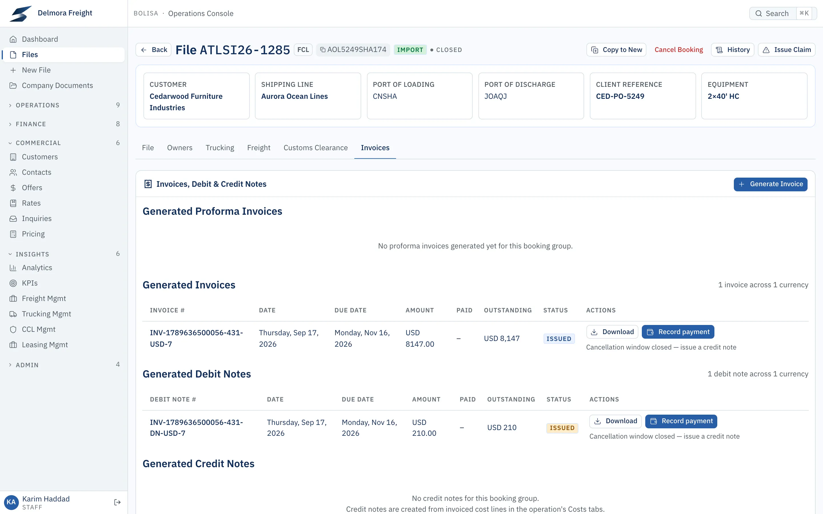 The invoices tab of the same file: an invoice and a debit note, with due dates, outstanding amounts and payment actions.